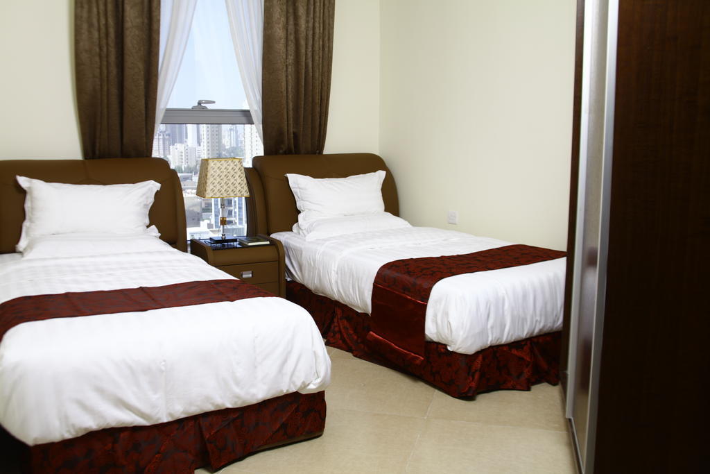 Laguna Hotel Suites Kuwait City Rom bilde